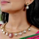 Hasli Red Kundan Embellished Gold Plated Necklace Set